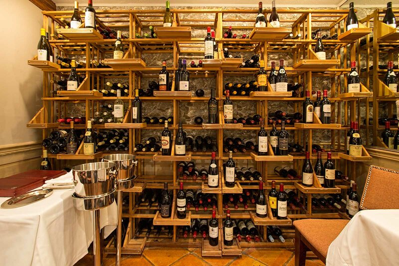 Wine room with shelves of wine bottles